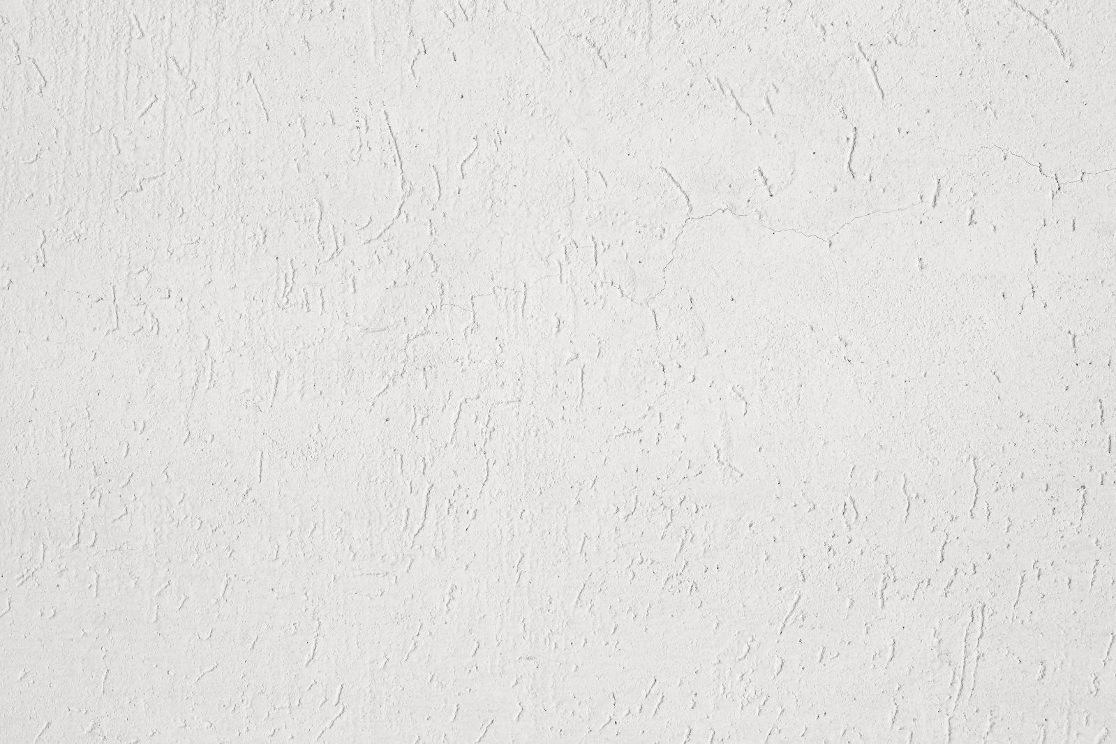 A close up of a white paper texture.
