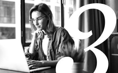 Woman working on a laptop by a window, with a large white “3” overlay.