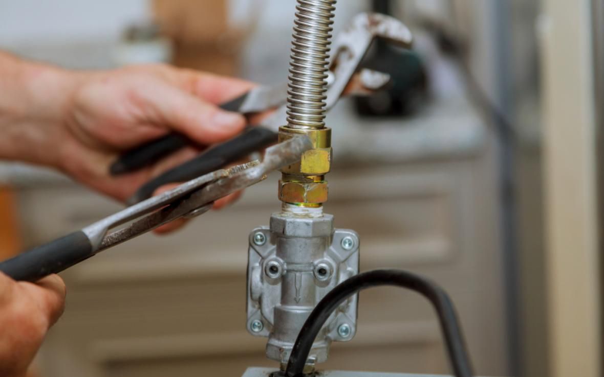 A plumber working on natural gas lines