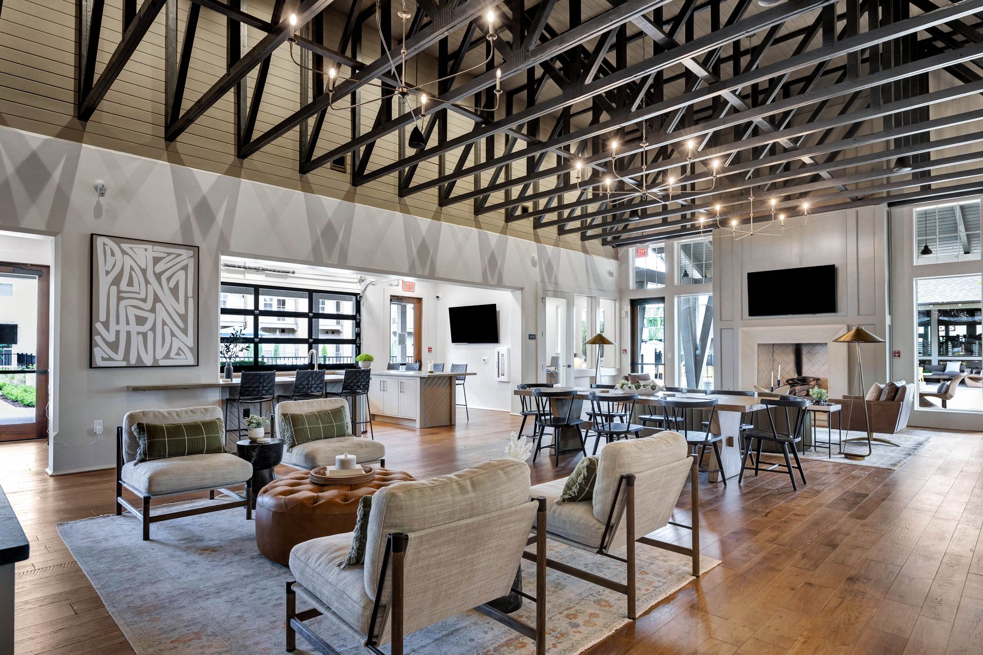 A potted plant is sitting on a table next to a lamp.