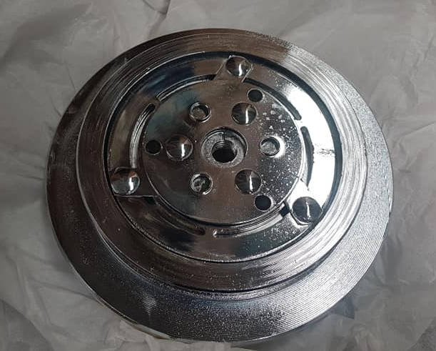 professional spraying chemical on metal