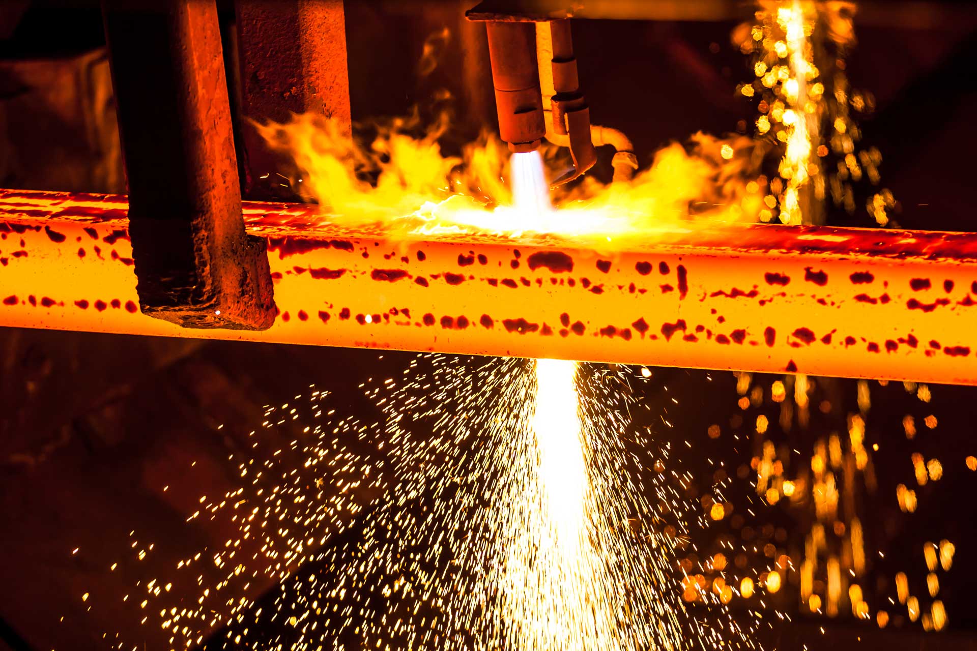 professional spraying chemical on metal