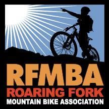 A silhouette of a person on a mountain bike points toward a sunburst in the sky above the text