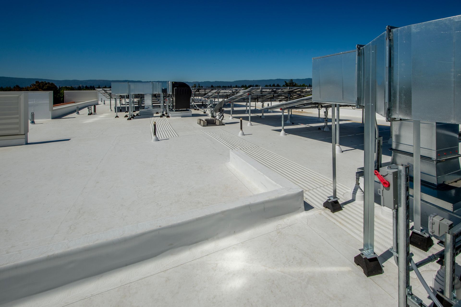 Membrane roof on a large office building.