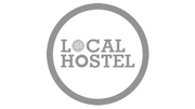 Logotipo do Local Hostel com borda circular cinza e texto em negrito cinza sobre fundo branco.