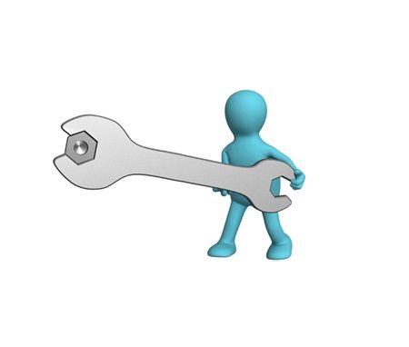little blue figure holding oversized spanner