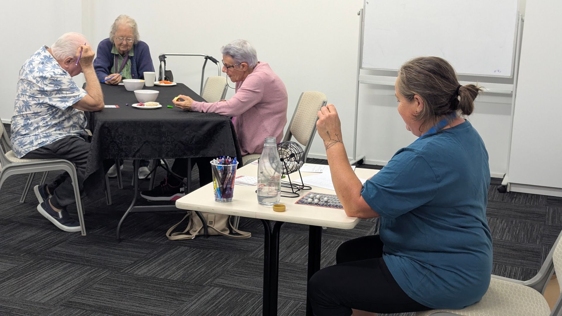 Amanda calls the bingo at this week's Tea & Talk ... who had more fun ... ?