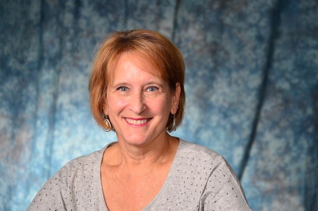 Administrative assistant Sharon Racht