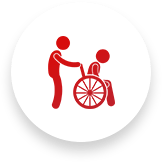 Red figure pushing a person in a wheelchair.