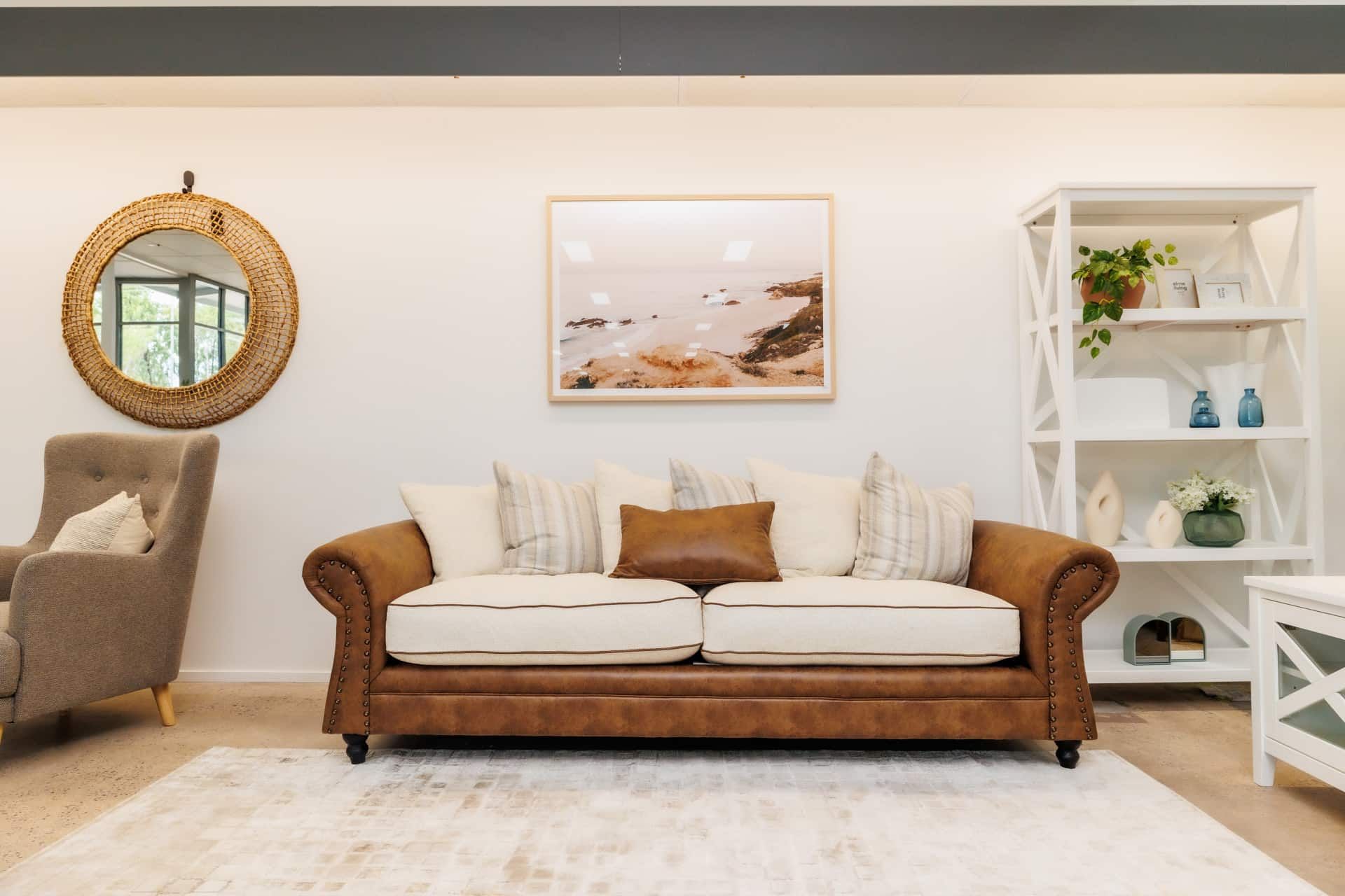 A Living Room With a Couch, Rug and painting on the wall — The Comfort Zone Darwin In Darwin, NT