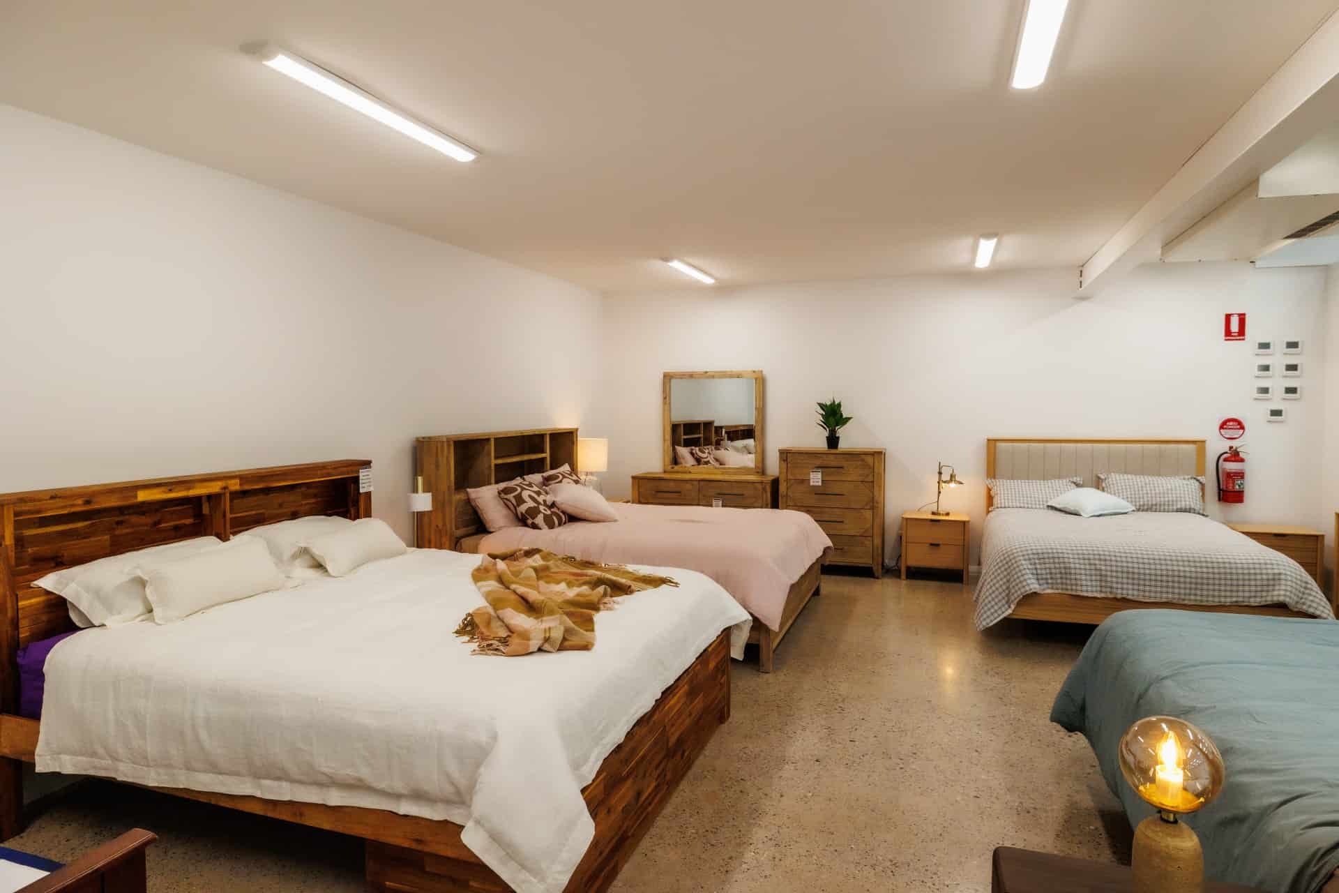 A show room with beds and bedroom furniture on display — The Comfort Zone Darwin In Darwin, NT