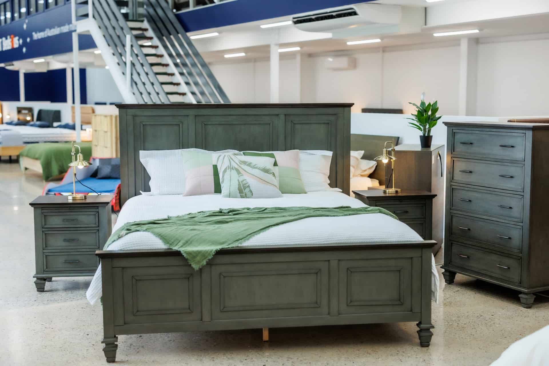 A bed on display with bedroom furniture in the background — The Comfort Zone Darwin In Winnellie, NT