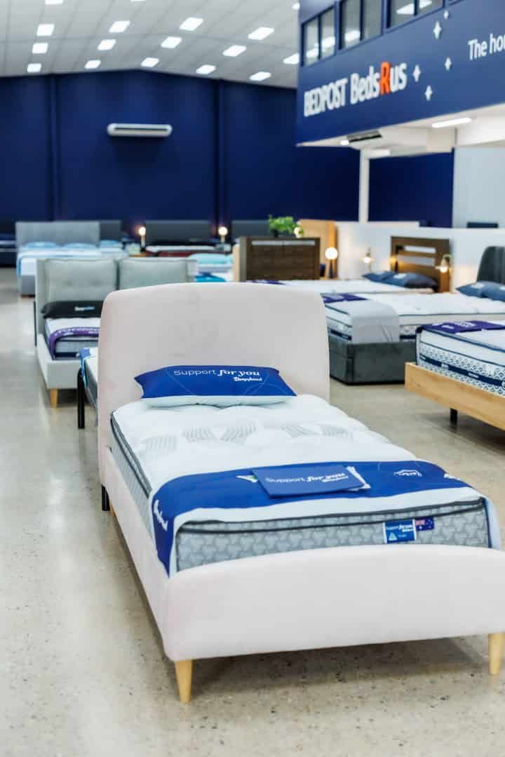 A Bedroom With a Bed, Television, and Large Windows Overlooking the Ocean — The Comfort Zone Darwin In Nightcliff, NT