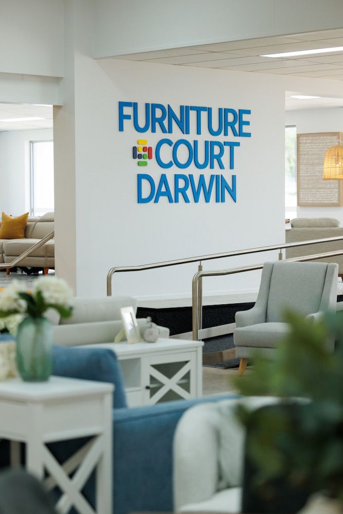 A Room With Furniture and a Sign That Says Furniture Court Darwin — The Comfort Zone Darwin In Winnellie, NT