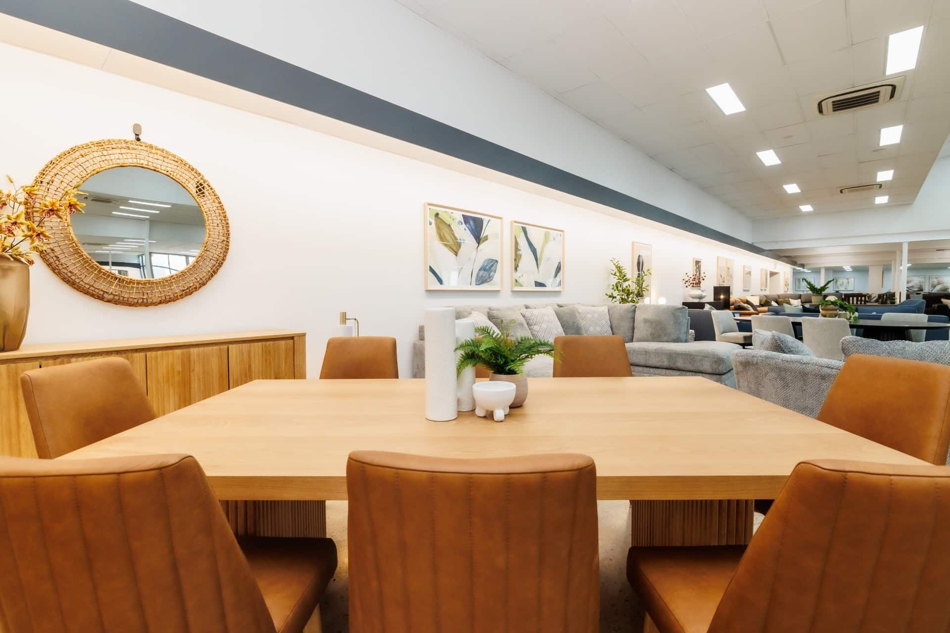 A Dining Room Table With Chairs and a Mirror in a Store — The Comfort Zone Darwin In Winnellie, NT