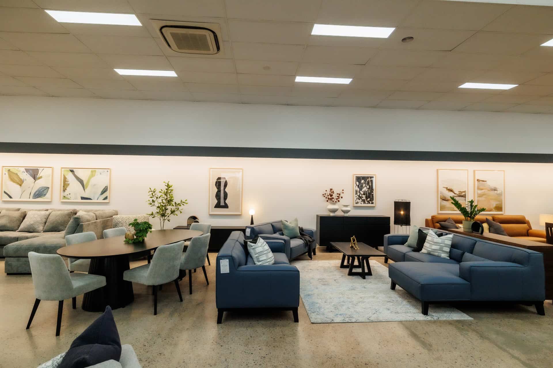 A Living Room Filled With Furniture and a Table — The Comfort Zone Darwin In Winnellie, NT