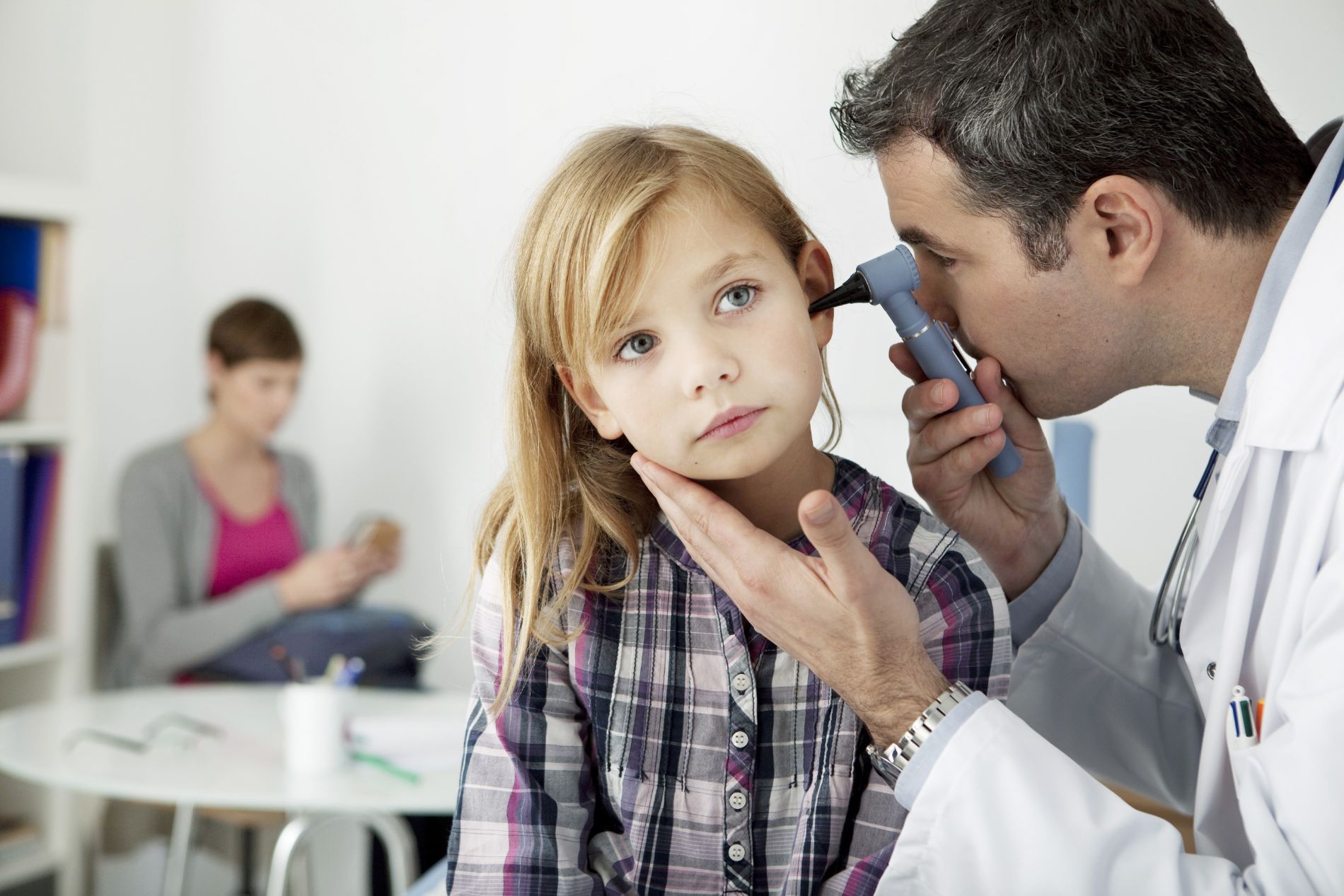 a child getting an ear exam