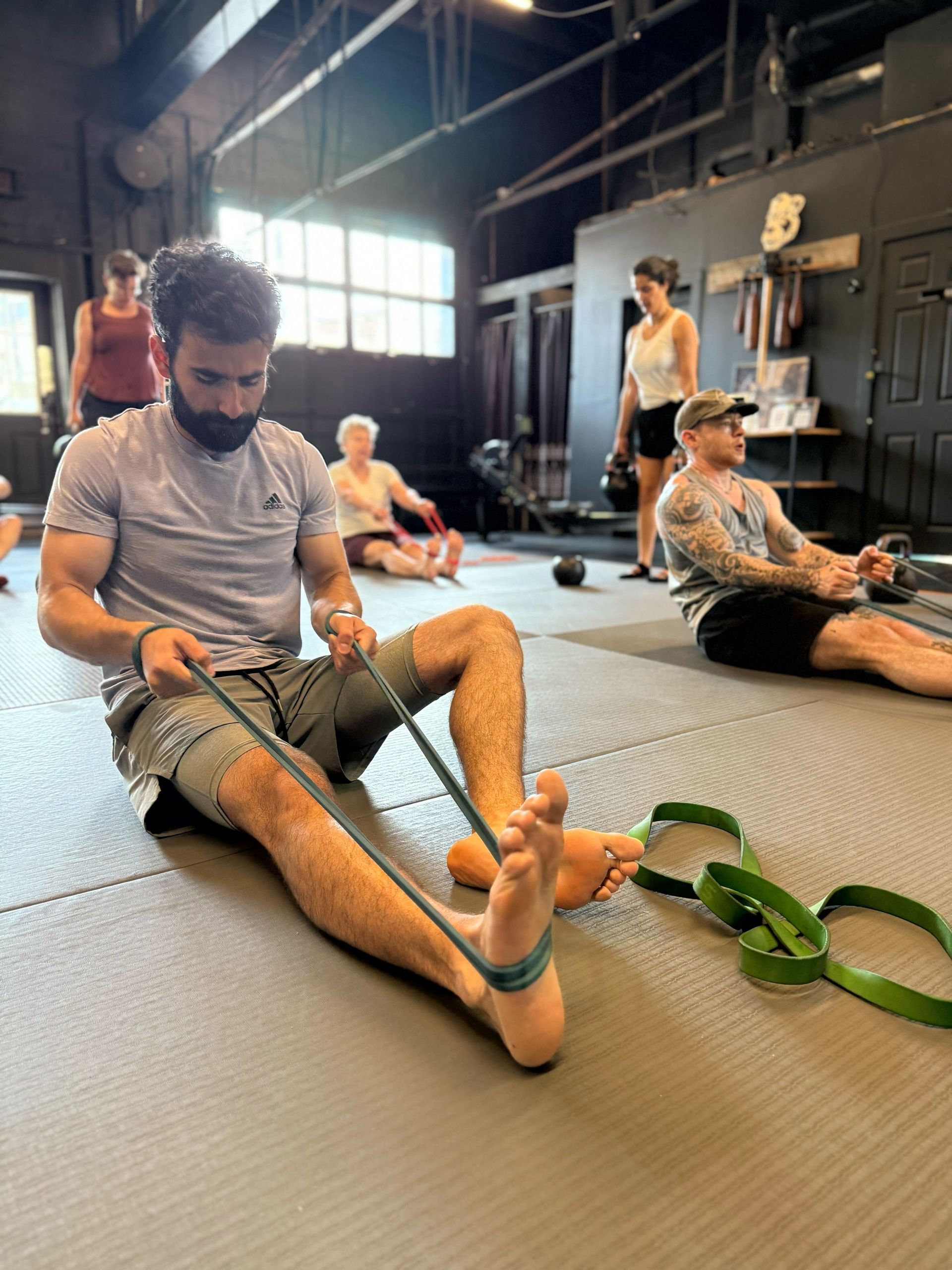 Members training in a guided group workout at Soma MVMT in Maplewood, NJ, building strength and consistency.