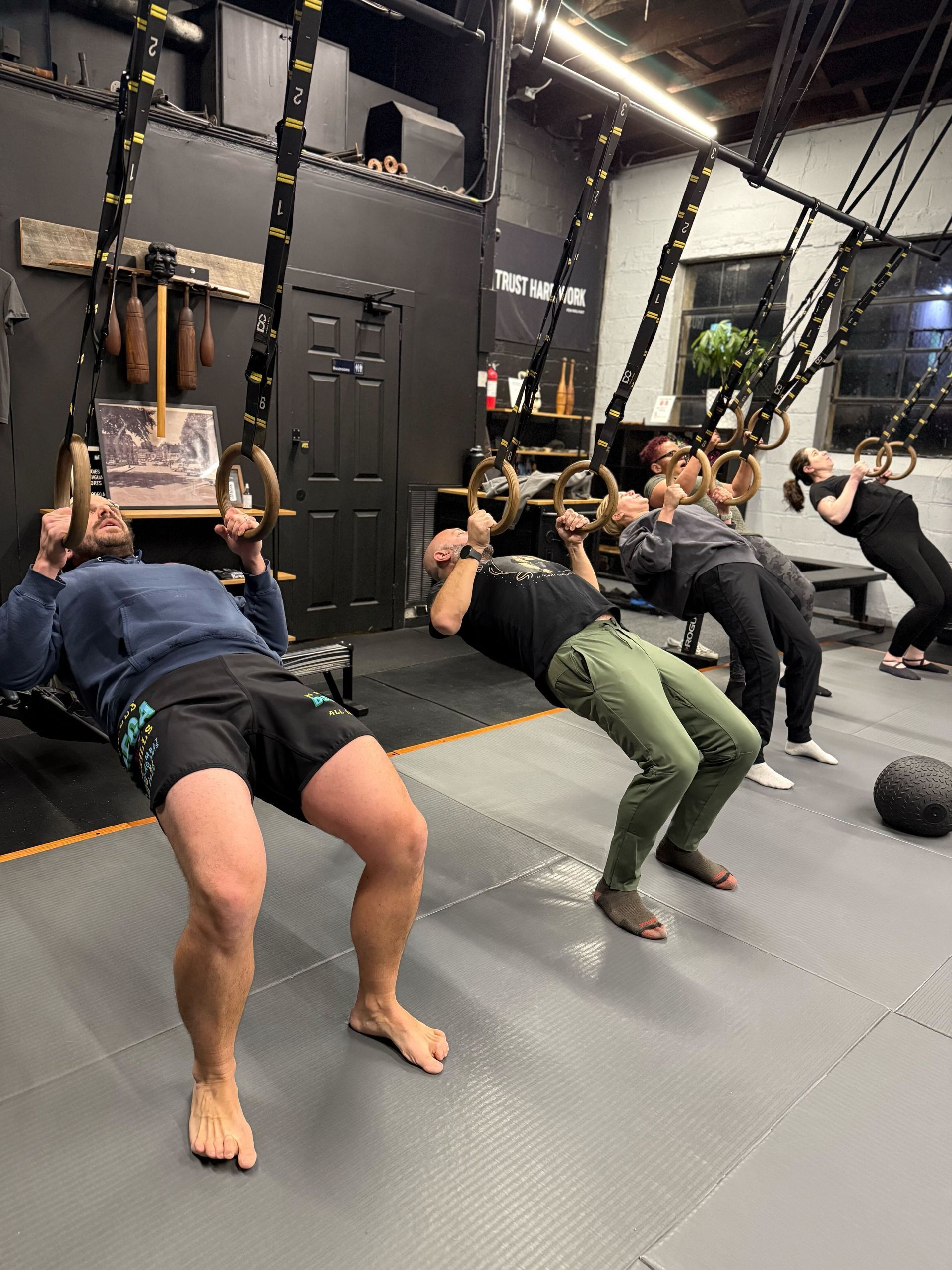 Members training in a tech-enhanced group class at Soma MVMT in Maplewood, NJ, tracking effort.