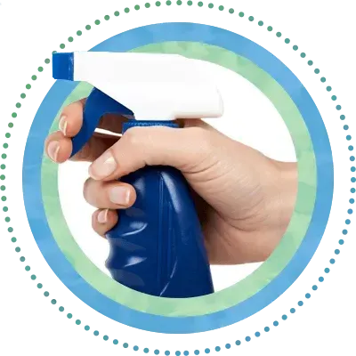 Hand holding a spray Hand holding a spray