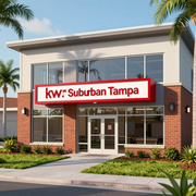 KW Suburban Tampa real estate office with red sign on a modern brick-and-glass building