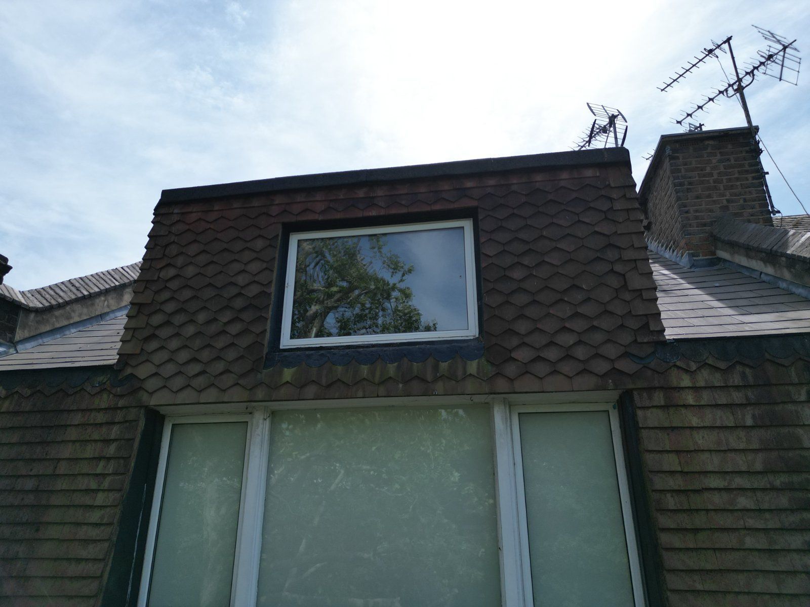 Dormer with clay tile hanging and slate roof, photographed for a condition survey and schedule of works
