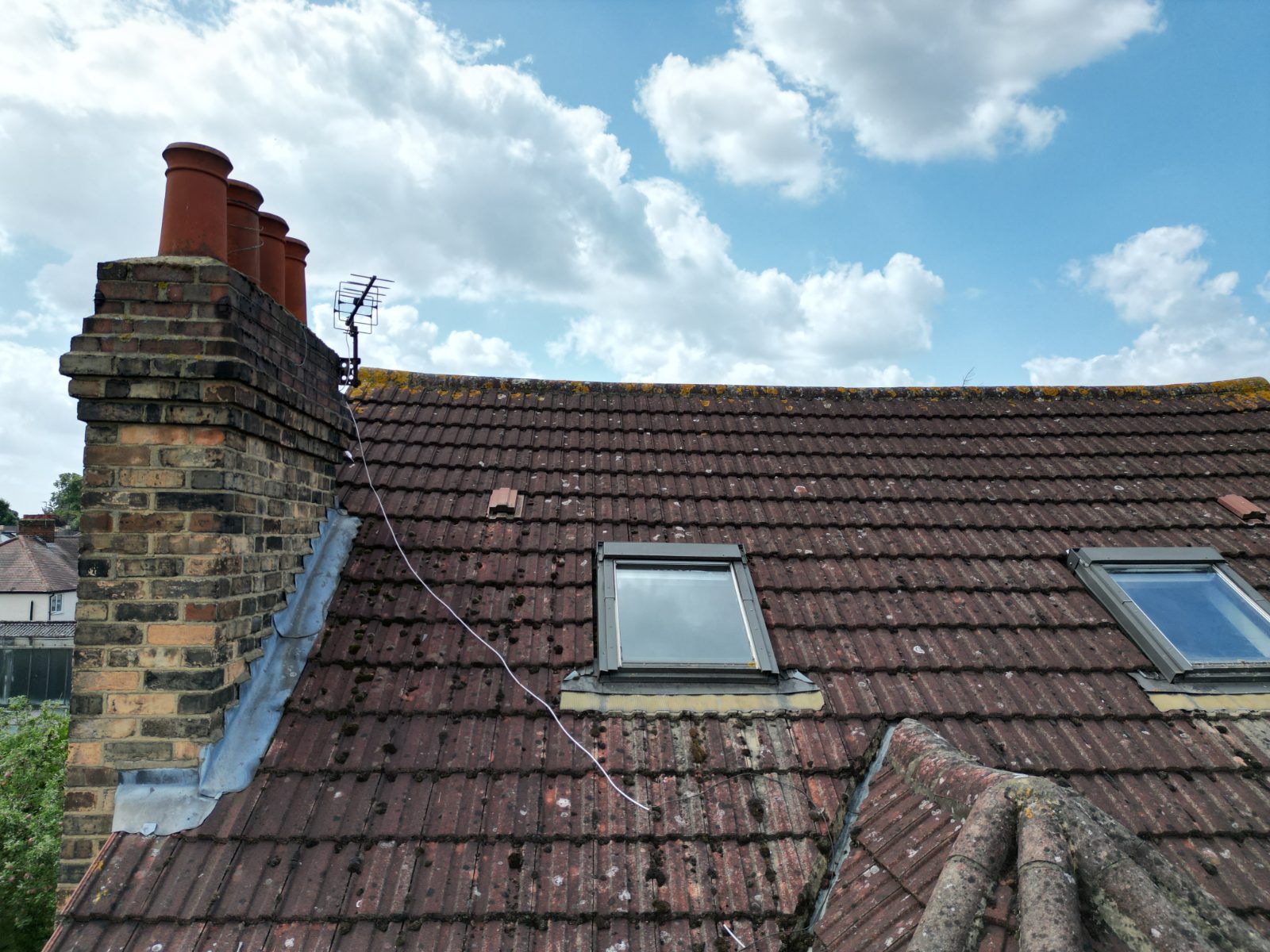Drone inspection of a chimney stack, lead flashing and pitched roof