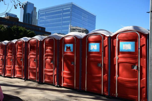 Clean and well-maintained portable toilet unit provided by a supplier for outdoor events | Worcester, MA 