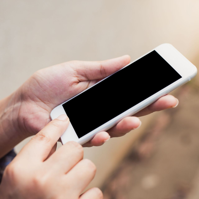Photo of a person texting