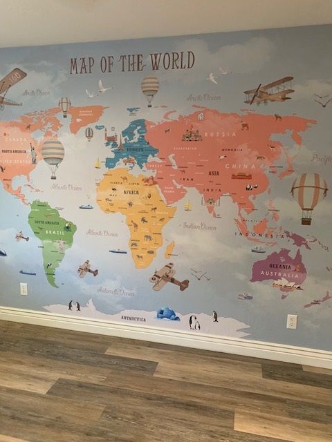 A wall with a map of the world on it