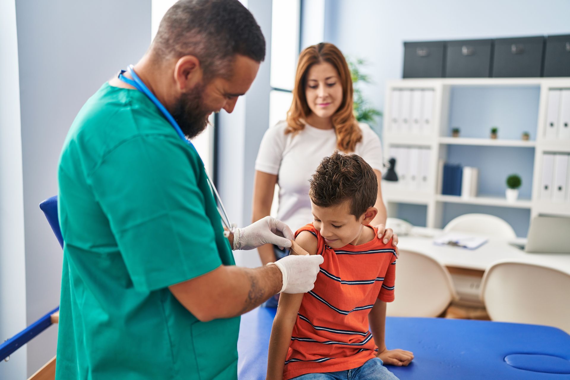 Child immunization with a pediatrician administering a vaccine.