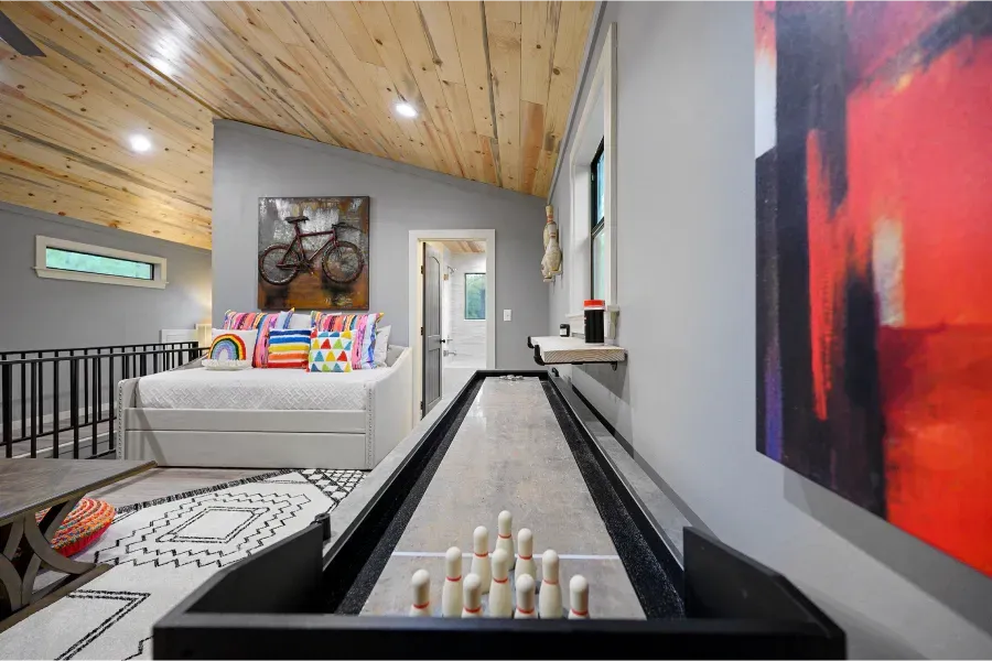 There is a bowling alley in the middle of the room.