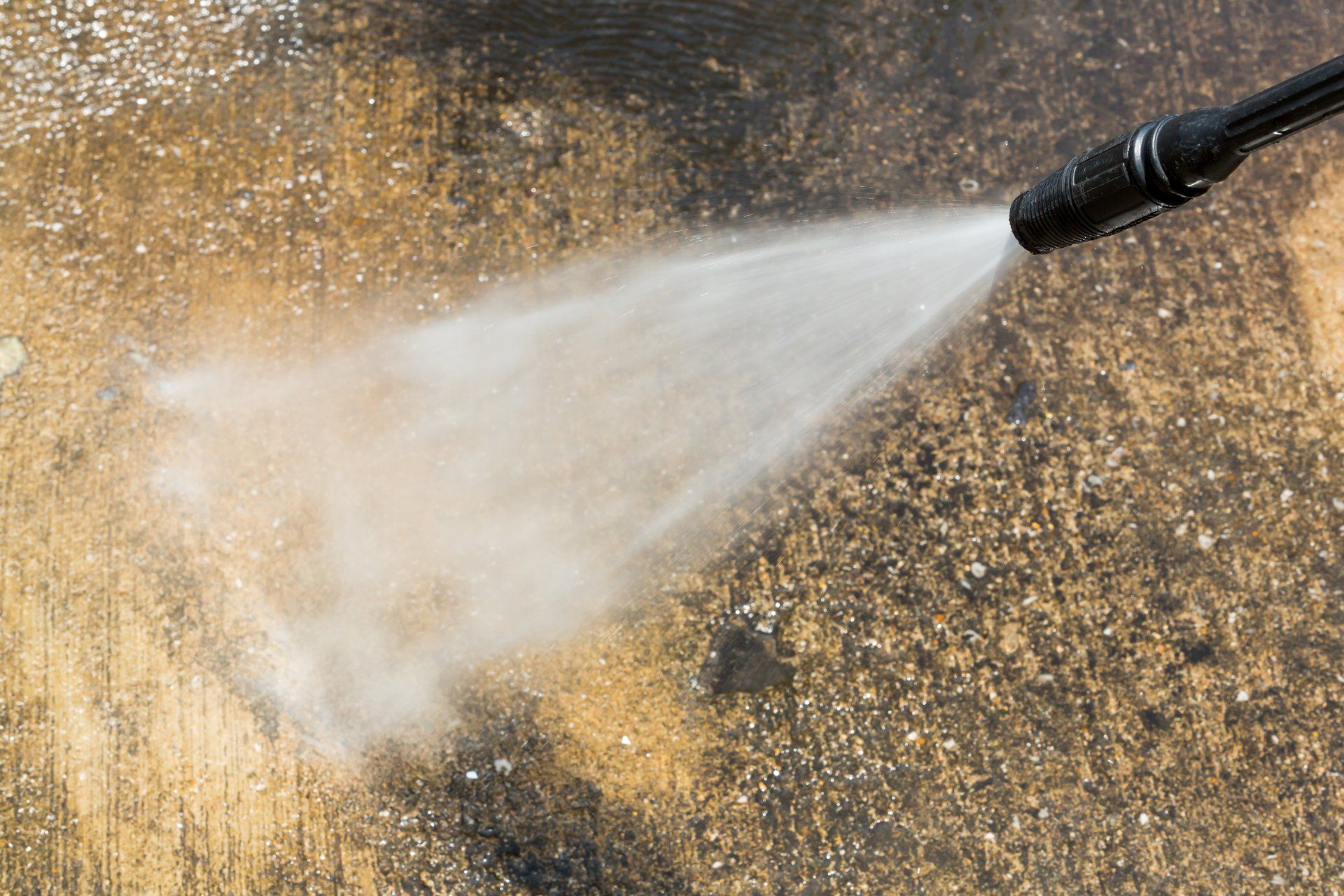 picture of pressure washing fayetteville power washing concrete surface