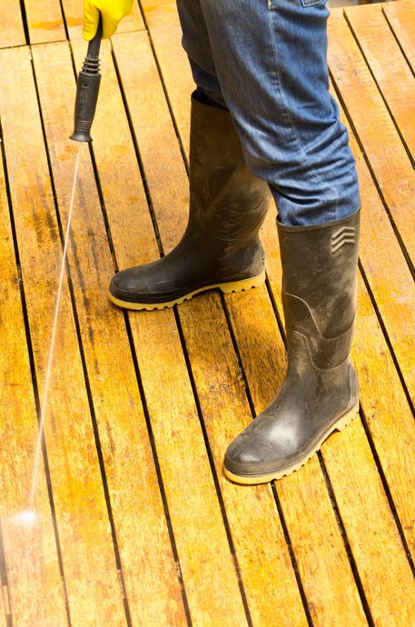 pressure washing wooden deck in Northwest Arkansas
