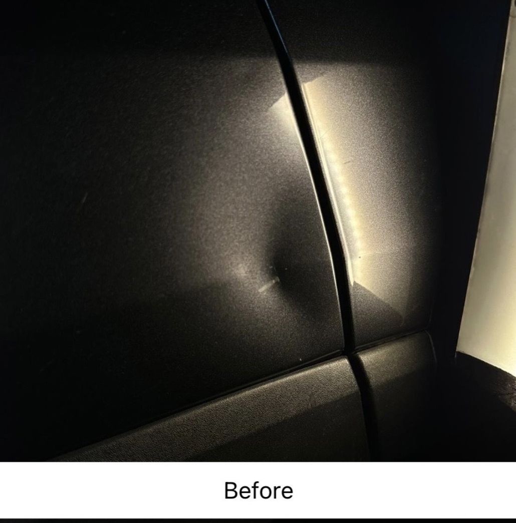 Close-up of a black car door with a dent and crease, labeled “Before”