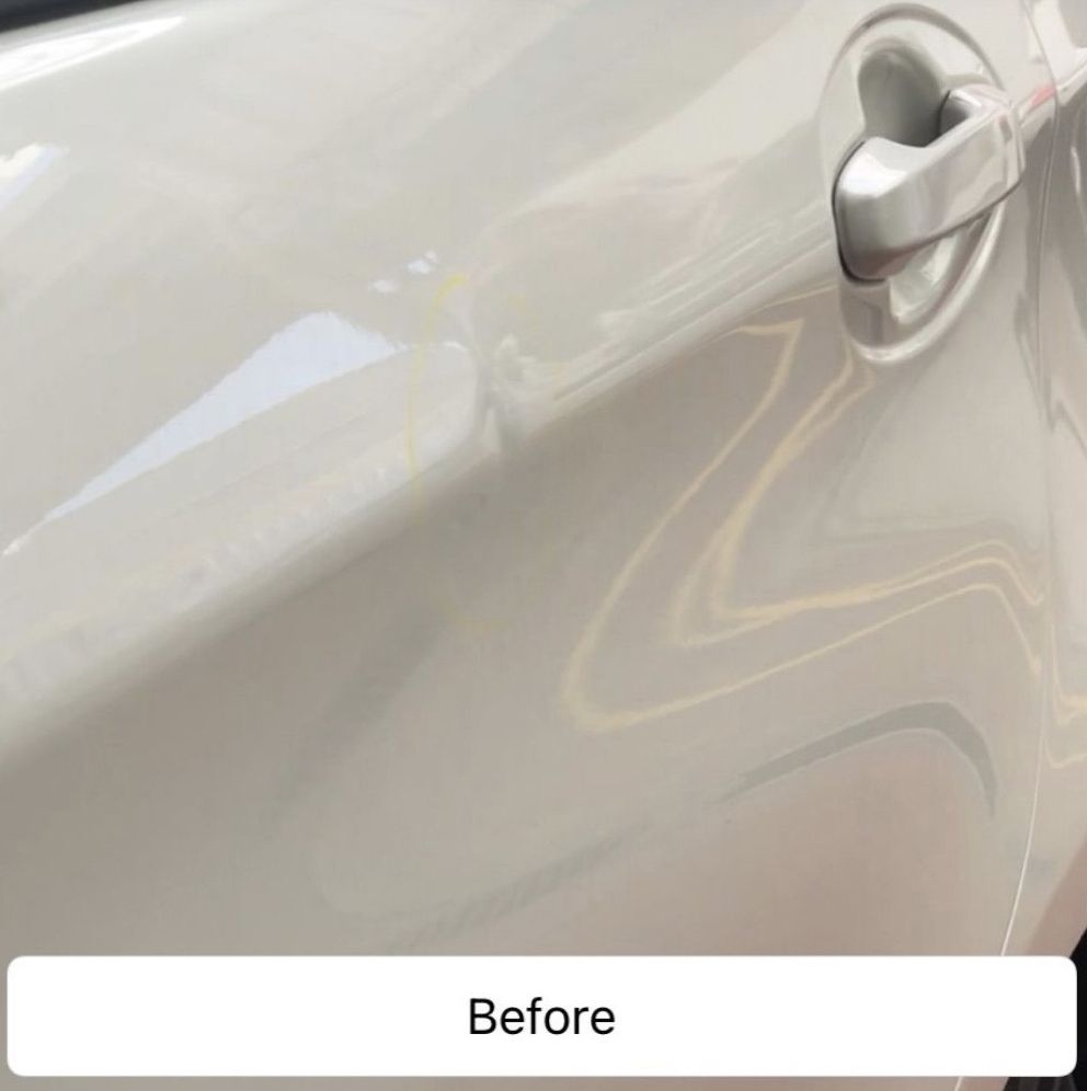White car door with a small dent and a “Before” label at the bottom