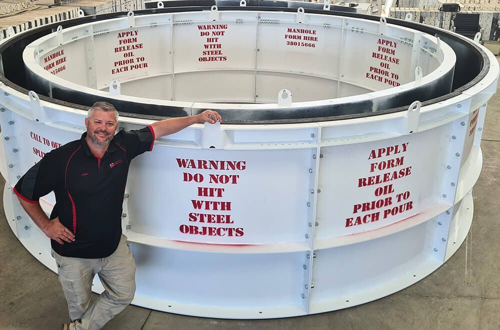 Jason Valle, Queensland Manager, with large Manhole Form Hire drum
