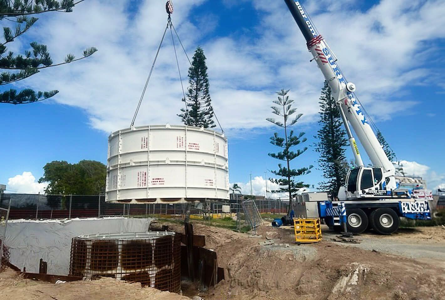 Large outer drum being placed by crane