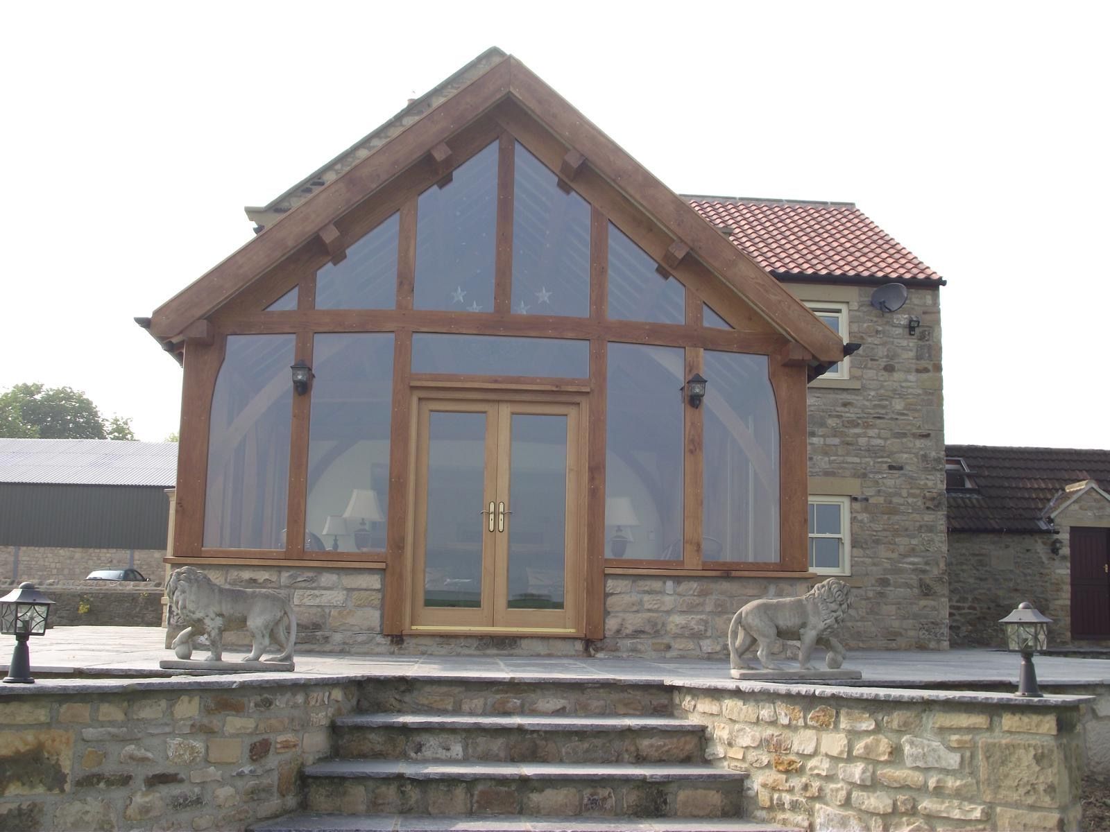 A large house with a lot of windows and stairs