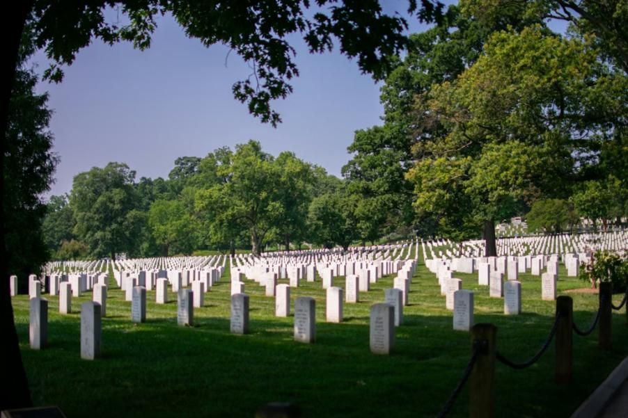 Rows of gravestones in a peaceful cemetery landscape, representing a funeral home and cremations Brookfield, IL.