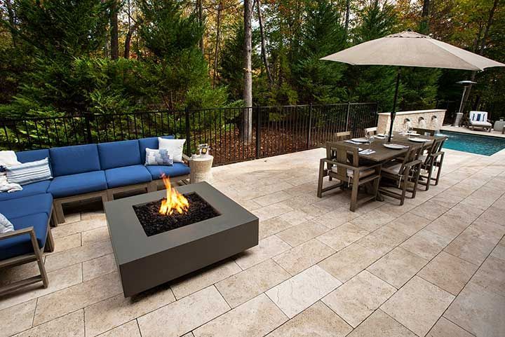Patio with blue seating and dining