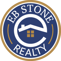 Eb Stone Realty logo with blue and gold circular emblem and house icon