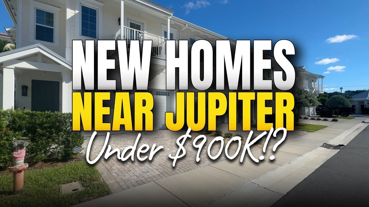 Exterior view of a townhome community with a sunny sky and text overlay about new homes near Jupiter.