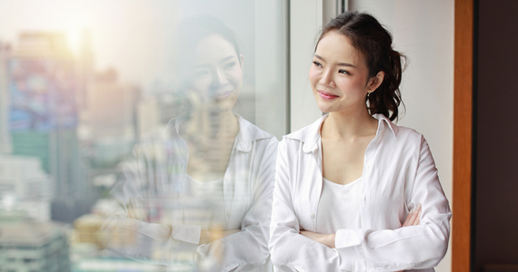 Woman in White Shirt — Midcoast Financial Planning Group in Tuncurry, NSW