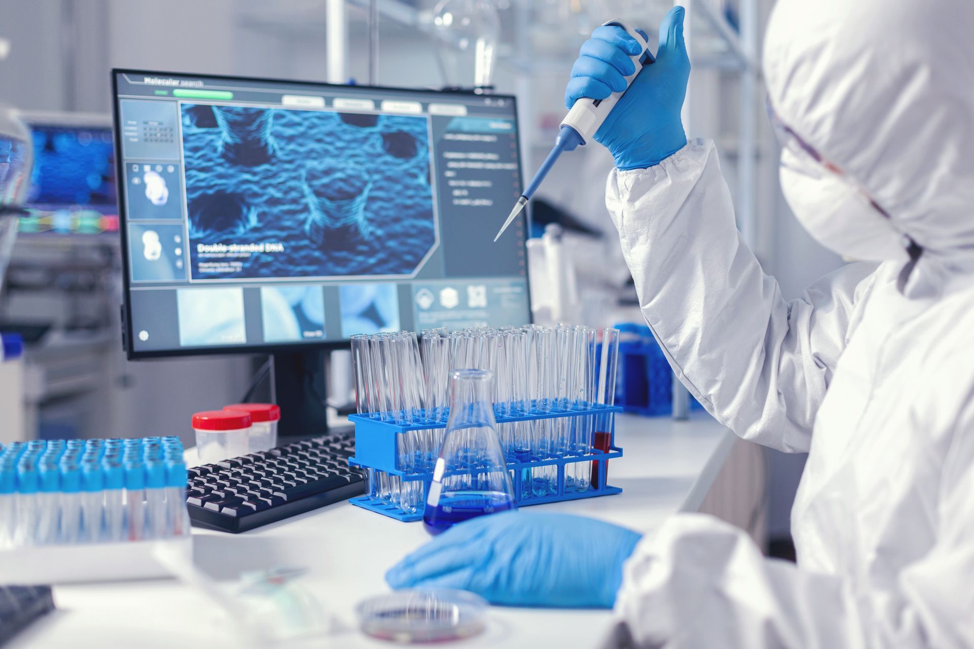 man performing analysis in laboratory
