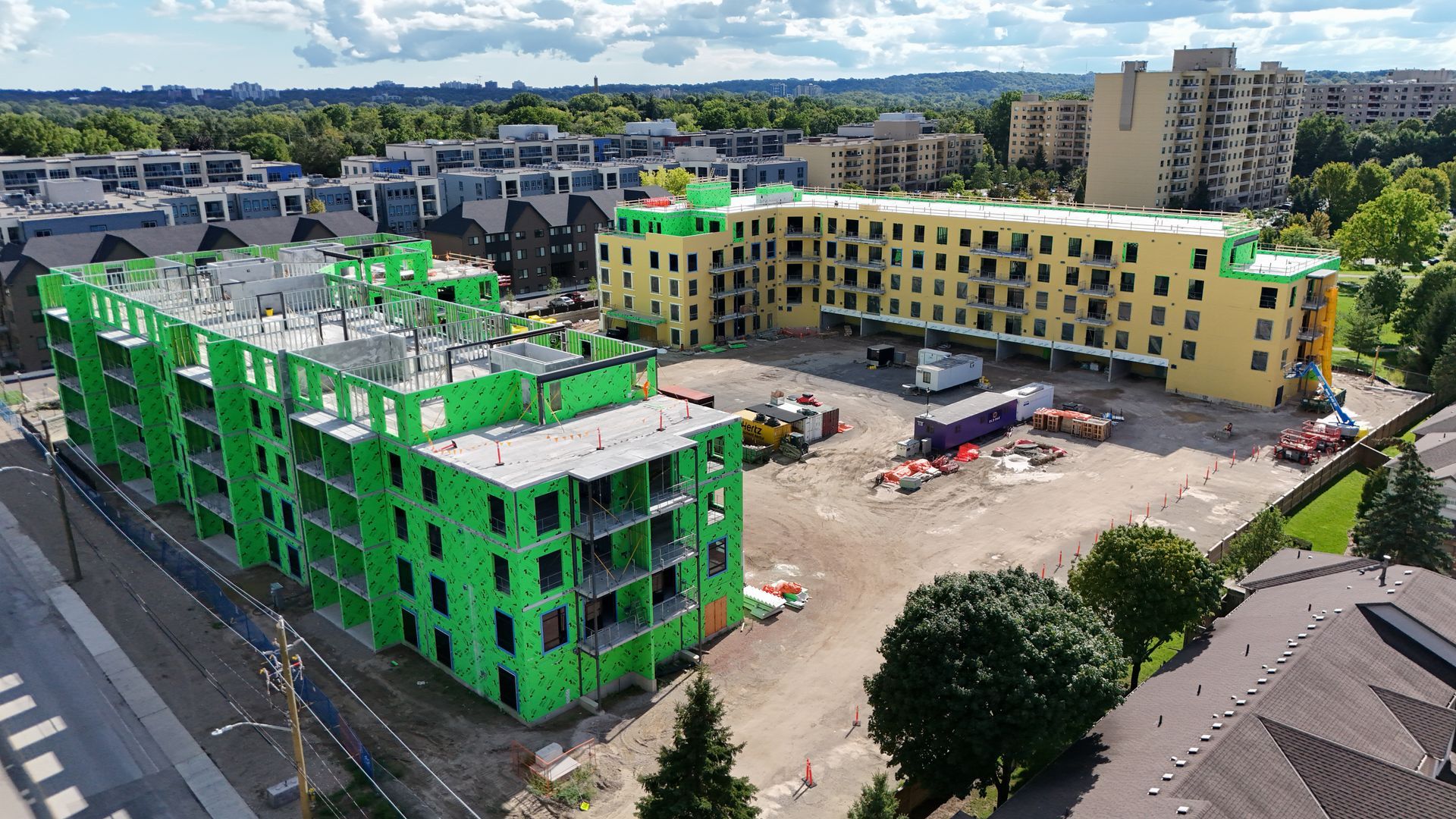 Drone photography by Lume Creative showing Aerial view of apartment buildings under construction
