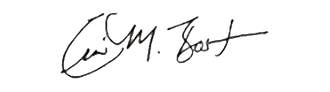 Black handwritten signature on a white background