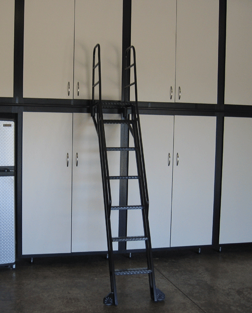 A ladder in a room with white cabinets