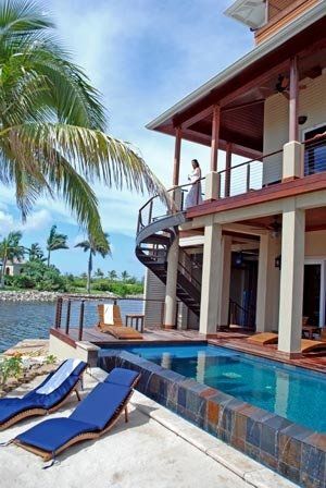 black metal stairs on a way to the pool at a private resort