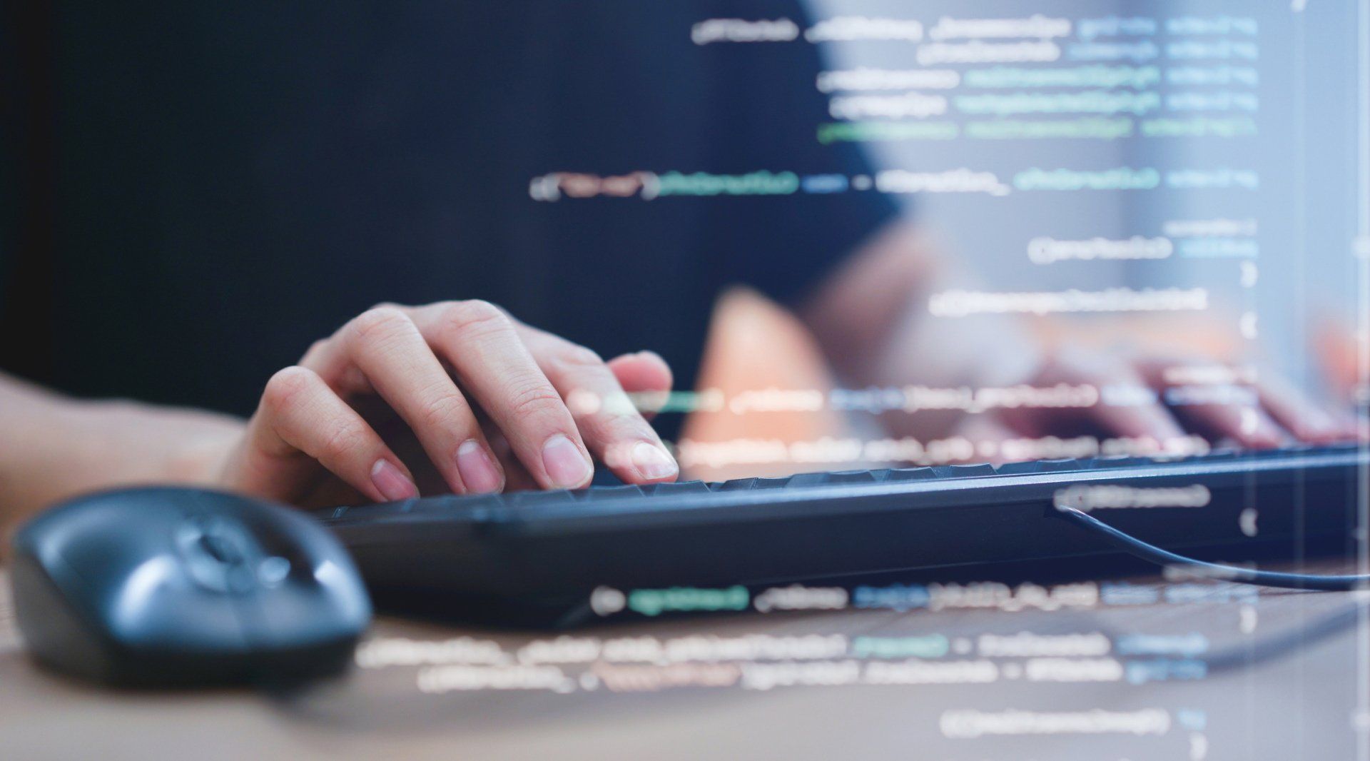 man typing on keyboard during a software training
